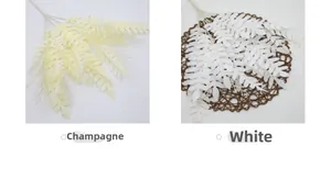 Close-up of artificial fern leaves in champagne and white for wedding flower arrangements