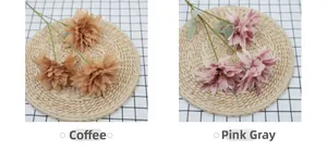 Detailed comparison of artificial coffee and pink grey dahlia flowers with realistic texture