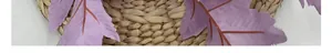 Detailed texture of purple artificial oak leaves on a rustic woven background