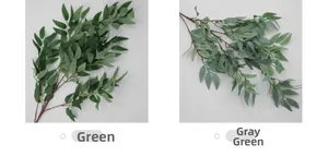 Detail view of artificial willow leaves in green and grey-green for wedding home decor