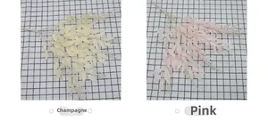 Detail view of artificial willow leaf branches in champagne and pink color options