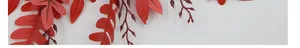 Detailed view of artificial red locust leaves and vines for wedding floral arrangements