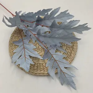 Artificial gray-blue oak leaves branch with reddish-brown veins for home floral decor
