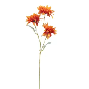Artificial 3-head orange dahlia flower spray with green stem on white background