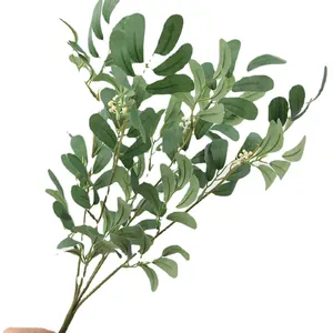 Artificial green leaf branch with small white flower clusters for home decoration