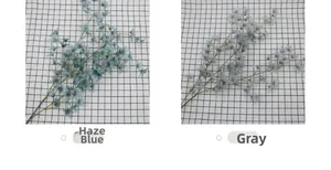 Detail view comparing artificial Oncidium dancing orchids in Haze Blue and Grey colors