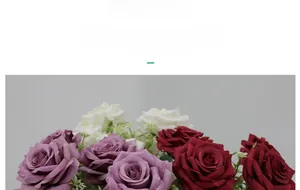 Detail of silk multi-head Austin roses in purple, dark red, and white for wedding decor