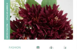 Detail of burgundy artificial daisy petals with realistic fabric texture and green leaf