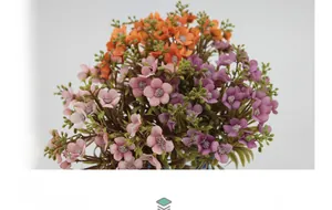 Close-up of artificial hydrangea bouquet in vibrant orange and purple autumn tones