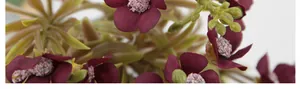 Macro close-up of burgundy artificial hydrangea petals with realistic velvet texture