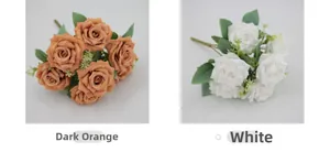 Detail view of artificial Austin roses in deep orange and pure white silk petals