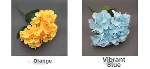 Detail view of artificial 5-fork hydrangea silk bouquets in orange and vibrant blue colors