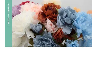 Close-up of artificial silk peony flowers in multiple colors for wedding decoration