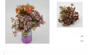 Detailed view of colorful faux hydrangea bunch with vibrant petals and green leaves