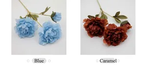 Close-up of blue and caramel silk peony flowers with realistic petals and stems
