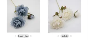 Detailed comparison of lake blue and white artificial peony flowers with silk petals