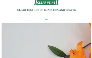 Detailed close-up of orange faux dahlia petals showing natural silk texture and edges