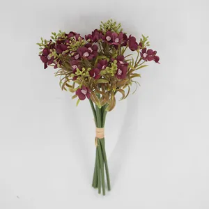 Handheld dark purple artificial hydrangea bouquet with green stems and hemp rope binding