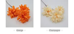 Detailed comparison of artificial dahlia flowers in orange and champagne hues