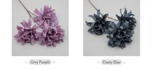 Detail of greyish purple and lake blue silk dahlia artificial flowers with three heads