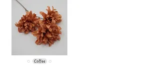 Detail of coffee brown artificial dahlia flowers with realistic layered petals and stems