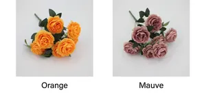 Détail de pivoines artificielles à 7 têtes en orange et vieux rose avec feuilles vertes