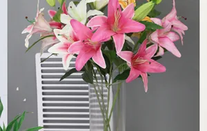 Detail of 3D printed lifelike lily petals with natural texture in a glass vase