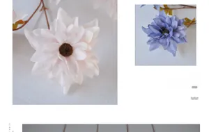 Close-up of artificial dahlia flowers with multi-layered petals and realistic stems
