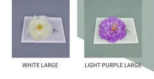 Detail of large white and light purple artificial peony flowers for DIY hair accessories