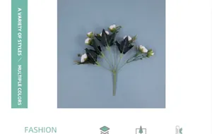 Detail view of artificial light pink rose buds with green leaves for home decoration