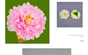 Close-up of artificial peony flower head with realistic multi-layered petals and stamens