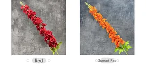 Detail of red and sunset red artificial delphinium flowers with realistic silk petals