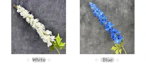 Detail view of artificial white and blue delphinium stems with textured petals