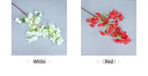 Detailweergave van witte en rode kunstmatige bougainvillea-takken voor decoratie