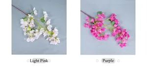 Detail van kunstmatige bougainvillea takken in de kleuren lichtroze en paars decoratie