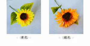 Detailoverzicht van kunstmatige zonnebloemen in geel en oranje voor decoratie