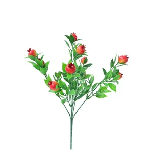 Ramo di melograno rosso artificiale con foglie verdi per decorazione domestica e tavola