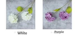 Detailed comparison of artificial hydrangea in white and purple with green leaves