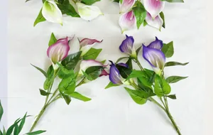 Flat lay view of 5-head PU calla lily bouquets in white, pink, rose, and purple