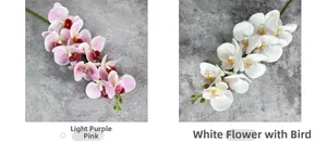 Detail view of artificial phalaenopsis orchids in light purple and white dotted petals