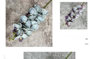 Detail of 9-head artificial Phalaenopsis orchid with realistic blue striped petals