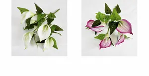 Detail view of artificial calla lilies in green and purple red with realistic textures