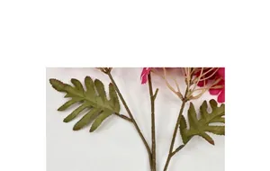 Detailed view of artificial silk hydrangea featuring realistic pink petals and green leaves