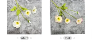 Detailed view of artificial poppy flowers in white and pink with realistic textures
