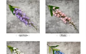 Nahaufnahme künstlicher hellvioletter und rosa Hyazinthenblüten mit grünen Blättern