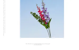 Detailed view of artificial Lily of the Valley in pink, purple, and green silk blossoms