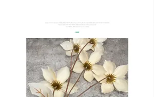 Detailed macro view of silk fabric flower petals with cream petals and dark stamens