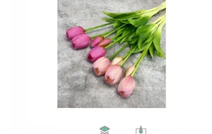 Detailed view of artificial pink tulips with realistic texture on a stone background