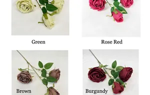 Detail view of Austin silk roses in green, rose red, brown, and dark red colors