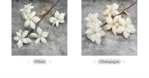 Detail showing white and champagne artificial flowers with realistic fabric petals